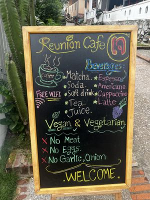 Sign   at Reunion Cafe Luang Prabang in Luang Prabang