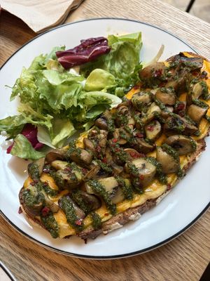 Mushroom cheddar (vegan) toast   at Calico Café  in Lille