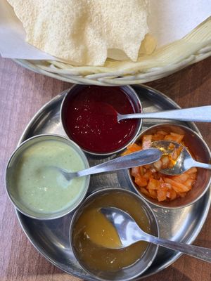 Pre-Meal: Pappadams with chutneys. 👌 £3.50. It’s vegetarian. at Thira Restaurant in Blackburn