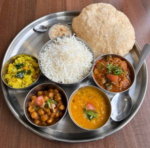 Lunch Time Special: Vegetarian Thali. £9.30. Served daily between 11:30 and 14:30.👌 at Thira Restaurant in Blackburn