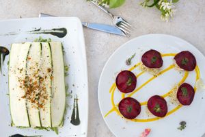 Rawfood dinner of beetroot ravioli and Zucchini lasagna with sun-dried tomato sauce, almond & macadamia  at Wild Beets in Ibiza
