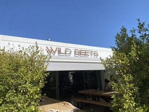 Large inside and outdoor seating on cool long tables  at Wild Beets in Ibiza