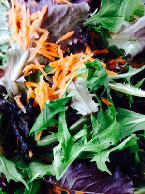 Salad with mesclun, olive and oil dressing at Chocolate Crust in Washington