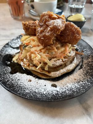 Pancakes with coleslaw and lions mane nuggetss  at Mr Watson in Amsterdam