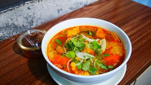 Bún Bò Huế  Chay / “Hue” Noodle Soup
Rice noodle, lemongrass, chilli, onion, soya bean, mushroom, herbs, tofu, corn, sauce at Ẩm thực chay Nhà Mình -  Our Home Vegetarian Cuisine in Hanoi