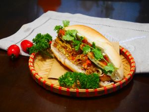 Bánh Mì Chay /  Vegetarian  “Banh Mi”

Red bean, taro, tofu, cucumber, herbs, tomato sauce, soya bean,
 at Ẩm thực chay Nhà Mình -  Our Home Vegetarian Cuisine in Hanoi