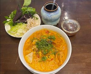 Bún Riêu Chay / “Rieu” Noodle Soup
Rice noodle, mushroom, tomato, tofu, fried tofu, carrot, herbs, banana flower, corn, soya milk at Ẩm thực chay Nhà Mình -  Our Home Vegetarian Cuisine in Hanoi