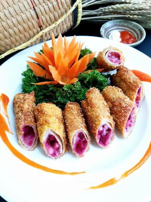Nem Rán Trái Cây / Fruit Fried Spring Rolls
Rice paper, mango, banana, apple, dragon fruit at Ẩm thực chay Nhà Mình -  Our Home Vegetarian Cuisine in Hanoi
