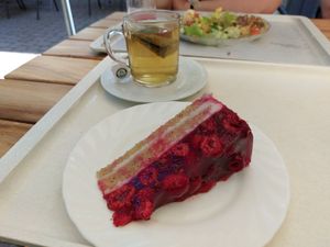 Raspberry coconut cake and herbal tea at Heller's Vegetarisches Restaurant & Cafe in Mannheim