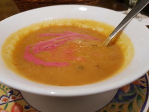Orange vegetable soup with beet tahini at Nagila in Jerusalem