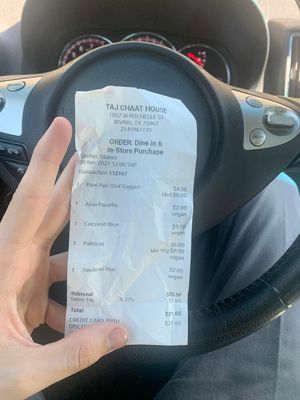 Prices - recommend the paratha over the roti, it’s the same price and same amount of food but much tastier!  at Taj Chaat House in Irving