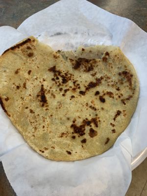 This Aloo Paratha was sooo good, the cashier recommended it. Potato stuffed bread.  at Taj Chaat House in Irving