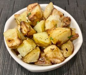 Garlic potatoes  at The Talk Restaurant in Dubai