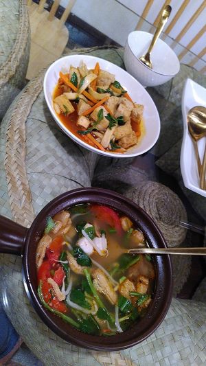 Mushroom ball soup and tofu mala spicy sauce at Reunion Cafe Luang Prabang in Luang Prabang