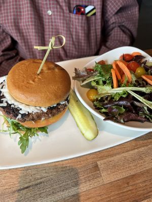 Vegan burger with side saladd  at Yard House in Orlando