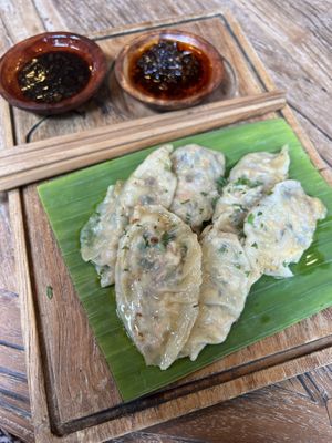 Vegan dumpling - mixed mushrooms, tofu, chayote, carrot, sweet corn, ubi noodle, long bean, chive  at Kayu Cafe in 