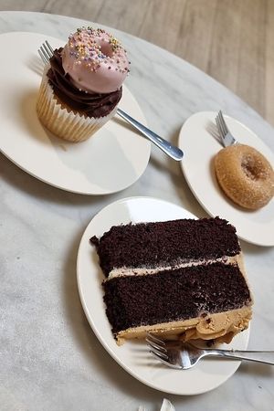 Chocolate cupcake with mini doughnut + Chocolate and caramel cake at Ruby's of London in South East London
