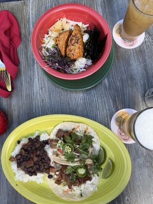 Grilled SALMoN Bowl along with Bahn Mi Tacos  at Hula's Island Grill in Monterey