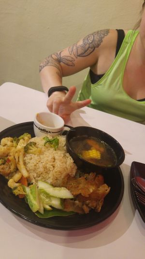 Chicken rice - add the chilli!! its so yum at HotCakes in Central Singapore