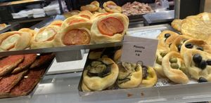 Pizzette con olive, pizzette con zucchine e pizzette con pomodoro   at My Bakery & Bistrot Firenze in Florence