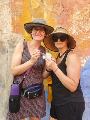 Enjoying avocado ice cream during our vegan street food tour at Unruly Travel Group Trips - Asheville in Asheville
