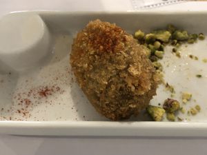 Vegan wild mushrooms and toasted hazelnut croquettes with paprika  at Restaurante Oslo in Valencia