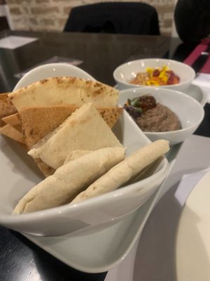 Muhammara y 'faux gras' de lenteja, con pan at Restaurante Oslo in Valencia