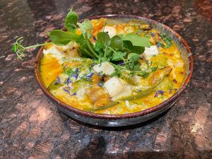 gratin van spruitjes en peulvruchten met cocos crème en kurkuma  at De Preuverie in Hasselt