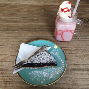 Vegan chocolate torte & soya strawberry milkshake at Cobbles and Clay - The Art Cafe in Haworth