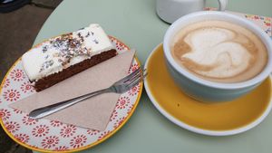 Carrot cake and latte at Cobbles and Clay - The Art Cafe in Haworth