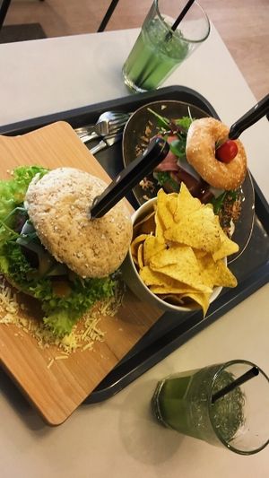 cheesy garlic deluxe burger and a bbq bacon burger bagel   at VegaVerso in Leuven