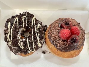 Cookies and cream + black cherry doughnuts (June 2026 vegan options)   at Perk Pantry in Inverness