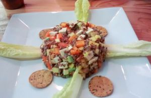 Avocado, Mango, Organic Quinoa Salad with Tofu at Lotus Seed Vegan in Vancouver