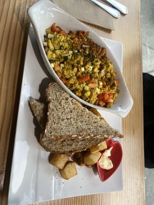Scrambled tofu! (A non vegan told me he thought they were better than actual eggs!)  #Veganuary at Lotus Seed Vegan in Vancouver