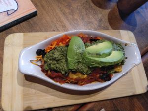 Gluten-free burrito bowl with hummus and avocado at Lotus Seed Vegan in Vancouver