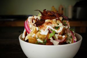 Chilaquiles with bacon and cheese. at Vegan Workshop in Tijuana