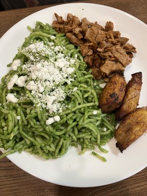 Tallarin Verde (Green pesto noodles w/ side of sweet plantains and vegan meat)  at Tallarin Verde Peruvian Restaurant in Blairsville
