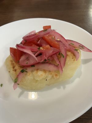 Tortilla de Yuca con Encebollado  at Tallarin Verde Peruvian Restaurant in Blairsville