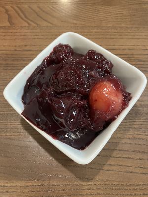 Jello-like dessert with chunks of fruit  at Tallarin Verde Peruvian Restaurant in Blairsville