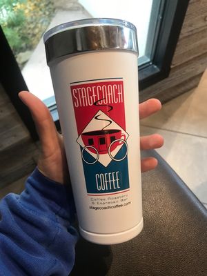 10/10 recommend getting one of the travel cups. Fits in the cup holders, keeps everything hot/cold, cute, and supports Stagecoach Coffee miles away.  at Stagecoach Coffee Roasters in Cooperstown