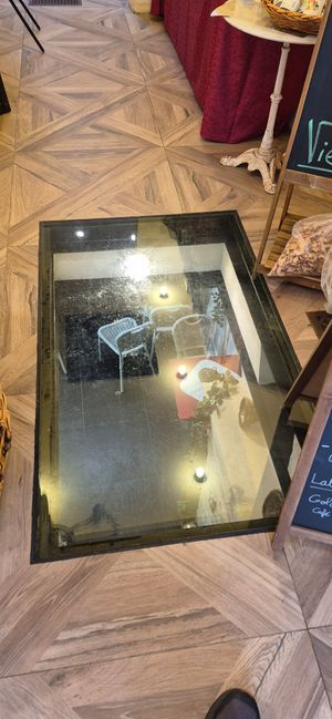A coffee shop is at the lower level of the store. at Les Produits De La Vie in Vincennes