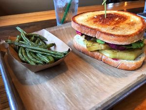Vegan green beans and vegan eggplant sandwich on sourdough at Public House in Monroe