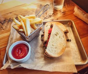 Vegan custom portobello and eggplant sourdough sandwich with vegan fries. at Public House in Monroe
