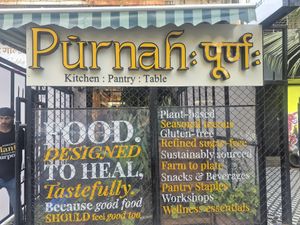 Outside at Pūrnah: Kitchen. Pantry. Table in Mumbai