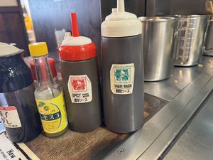 Clearly labeled sauces.  at Nagataya in Hiroshima