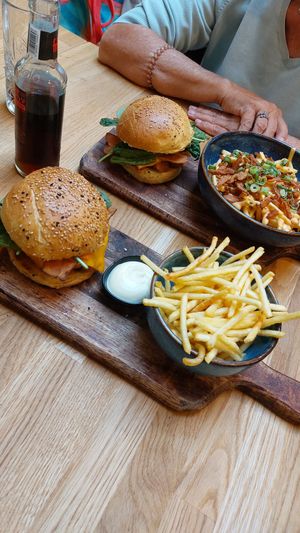 No chicken burgers + lucifer loaded fries at Tabi Loo Ixelles in Brussels