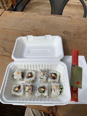 SushiLoving it! Ahi(ish)Tuna rolls on a sunny blue skies day out on the deck.  Bliss!   at Sushi Love in Portland