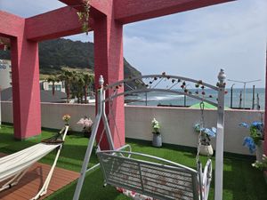 Seongsan mountain & ocean view at My Little Veggie Pub in Seogwipo