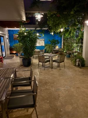 Outdoor garden seating area  at Restaurant Cuisine Wat Damnak in Phnom Penh