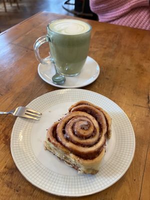 Cinnamon role and Matcha Oat Latte  at Black Veg in Bonn